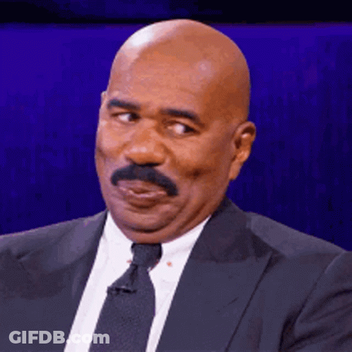 Man In Suit Making Funny Face GIF