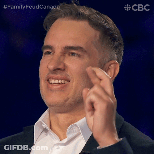 Man In Suit Making Funny Face GIF