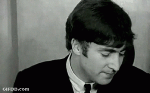 Man In Suit Making Funny Face GIF
