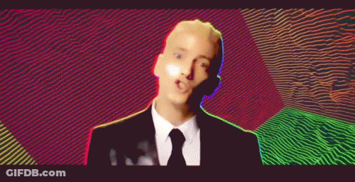 Man In Suit Making Funny Face GIF
