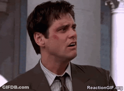 Man In Suit Making Funny Face GIF