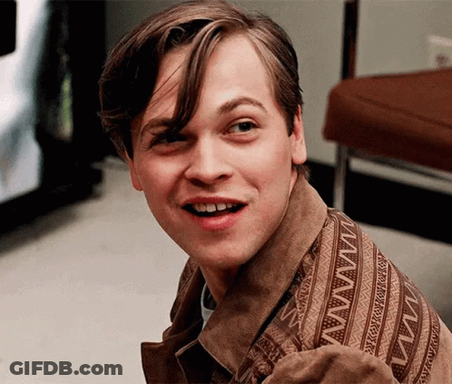 Man In Suit Making Funny Face GIF