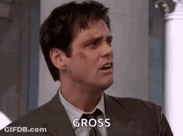 Man In Suit Making Funny Face Gross GIF