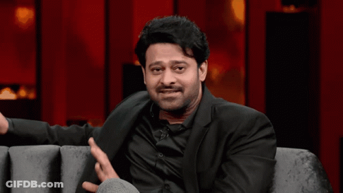 Man In Suit Making Funny Face GIF