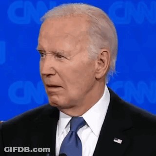 Man In Suit Making Funny Face GIF