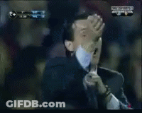 Man In Suit Making Funny Face In Crowd GIF