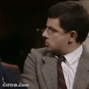 Man In Suit Making Funny Face GIF
