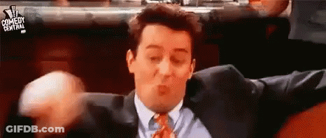 Man In Suit Making Funny Face GIF