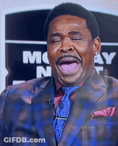 Man In Suit Making Funny Face GIF