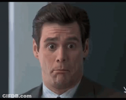 Man In Suit Making Funny Face GIF