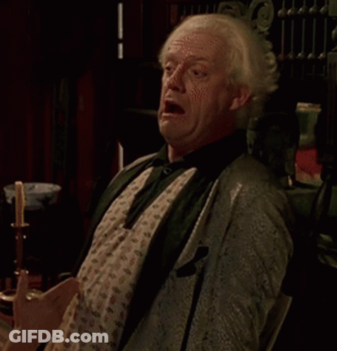 Man In Suit Making Funny Face GIF