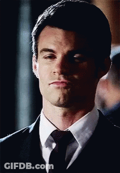 Man In Suit Making Funny Face GIF
