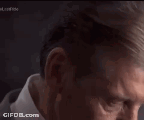 Man In Suit Making Funny Face GIF