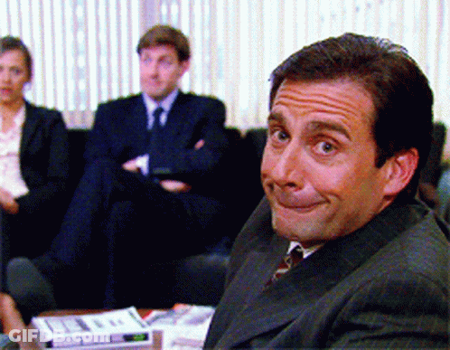 Man In Suit Making Funny Face GIF