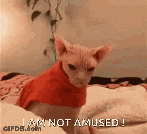 Man In Suit Making Funny Face Not Impressed GIF