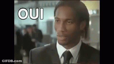 Man In Suit Making Funny Face GIF