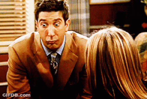 Man In Suit Making Funny Face GIF