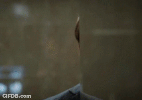 Man In Suit Making Funny Face GIF
