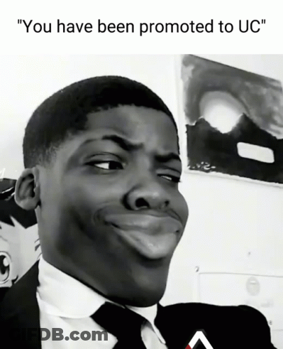 Man In Suit Making Funny Face Promoted To UC GIF