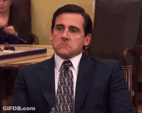 Man In Suit Making Funny Face GIF