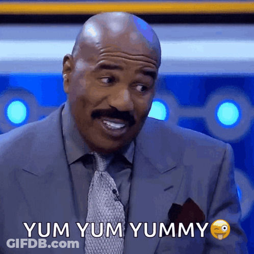 Man In Suit Making Funny Face GIF