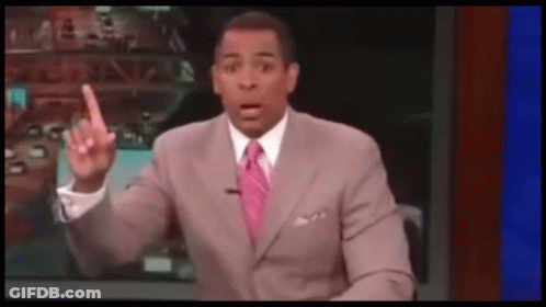 Man In Suit Making Funny Face GIF