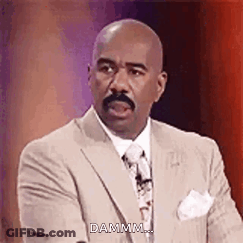 Man In Suit Making Funny Face Saying Damm GIF