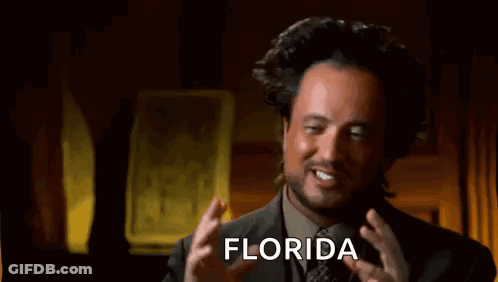 Man In Suit Making Funny Face Saying Florida GIF