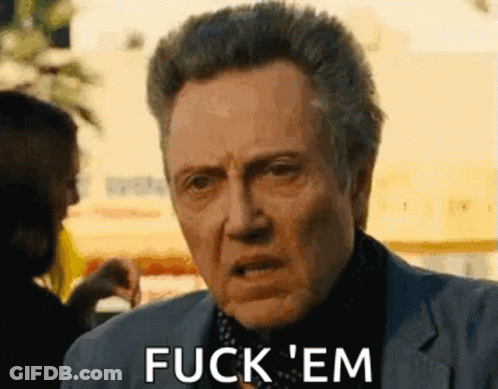 Man In Suit Making Funny Face Saying Fuck Em GIF