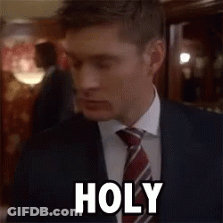 Man In Suit Making Funny Face Saying Holy GIF