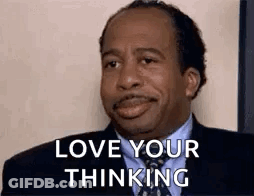 Man In Suit Making Funny Face Saying Love Your Thinking GIF