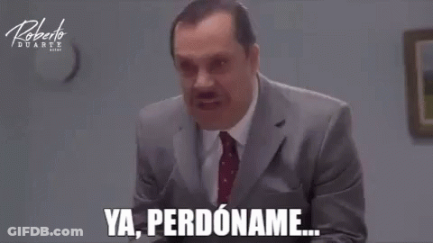Man In Suit Making Funny Face Saying Ya Perdoname GIF