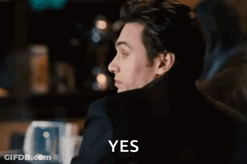 Man In Suit Making Funny Face Saying Yes GIF