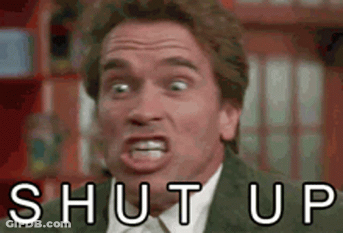 Man In Suit Making Funny Face Shut Up GIF