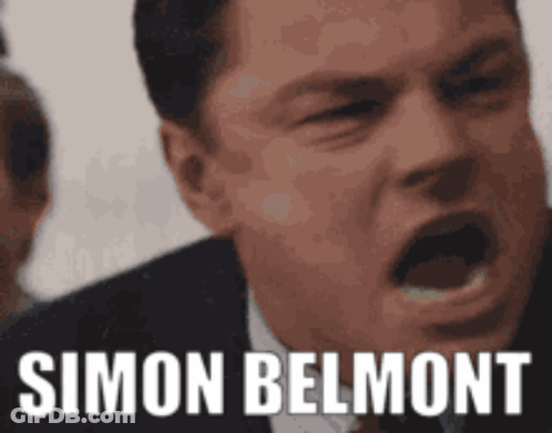 Man In Suit Making Funny Face Simon Belmont GIF