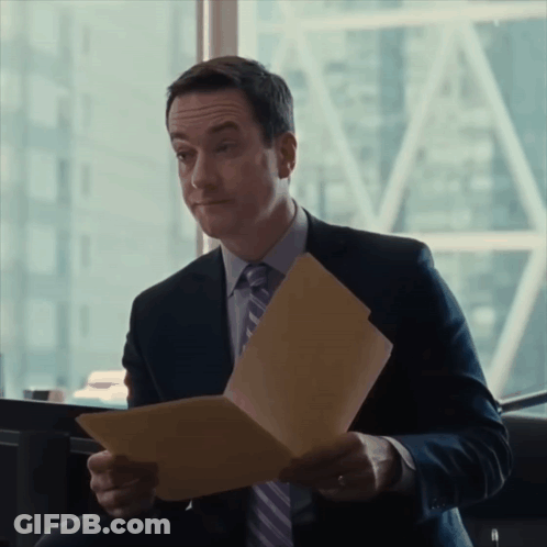 Man In Suit Making Funny Face GIF