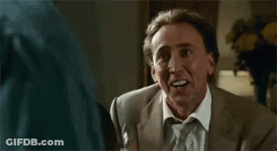 Man In Suit Making Funny Face Talking To Another Man GIF