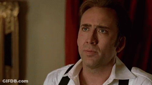 Man In Suit Making Funny Face Talking To Another Man GIF