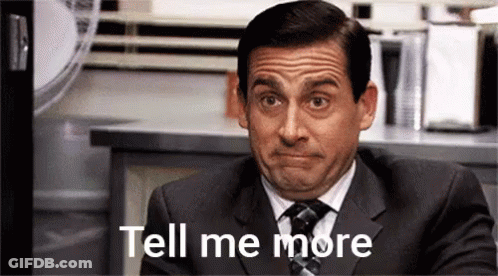 Man In Suit Making Funny Face Tell Me More GIF