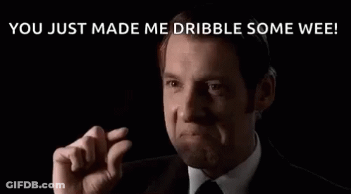 Man In Suit Making Funny Face GIF
