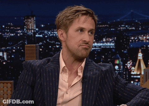 Man In Suit Making Funny Face GIF
