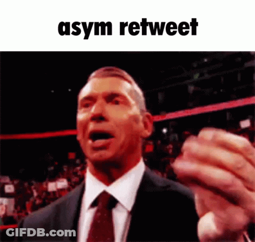 Man In Suit Making Funny Face With Asym Retweet GIF
