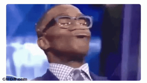 Man In Suit Making Funny Face With Glasses GIF