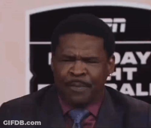 Man In Suit Making Funny Face With Hands GIF