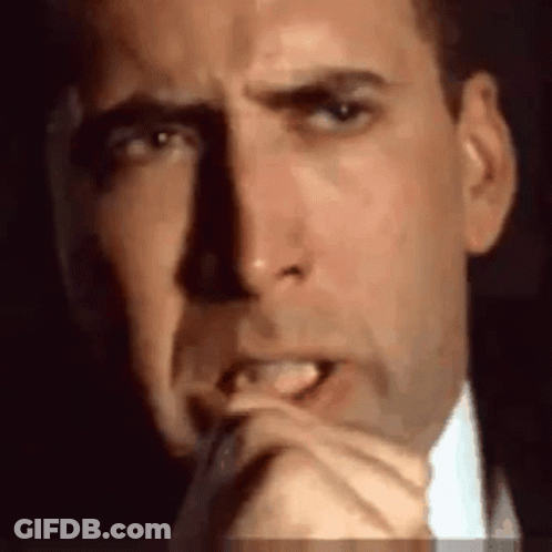 Man In Suit Making Funny Face With Mouth Open GIF