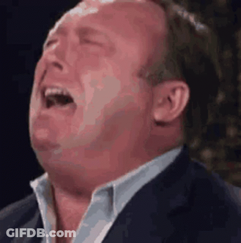 Man In Suit Making Funny Face With Mouth Open GIF