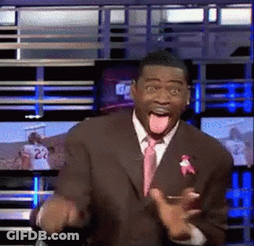 Man In Suit Making Funny Face With Tongue Out GIF