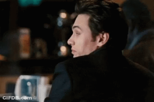 Man In Suit Making Funny Face GIF