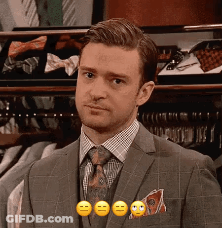 Man In Suit Making Funny Face GIF