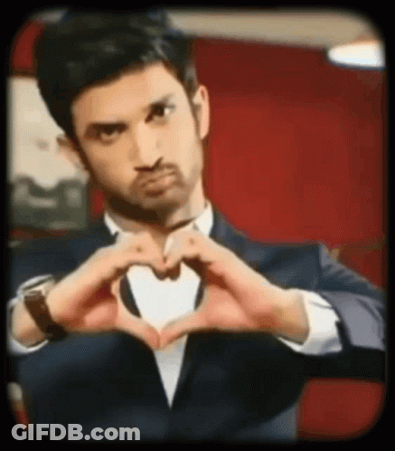 Man In Suit Making Heart Shape GIF